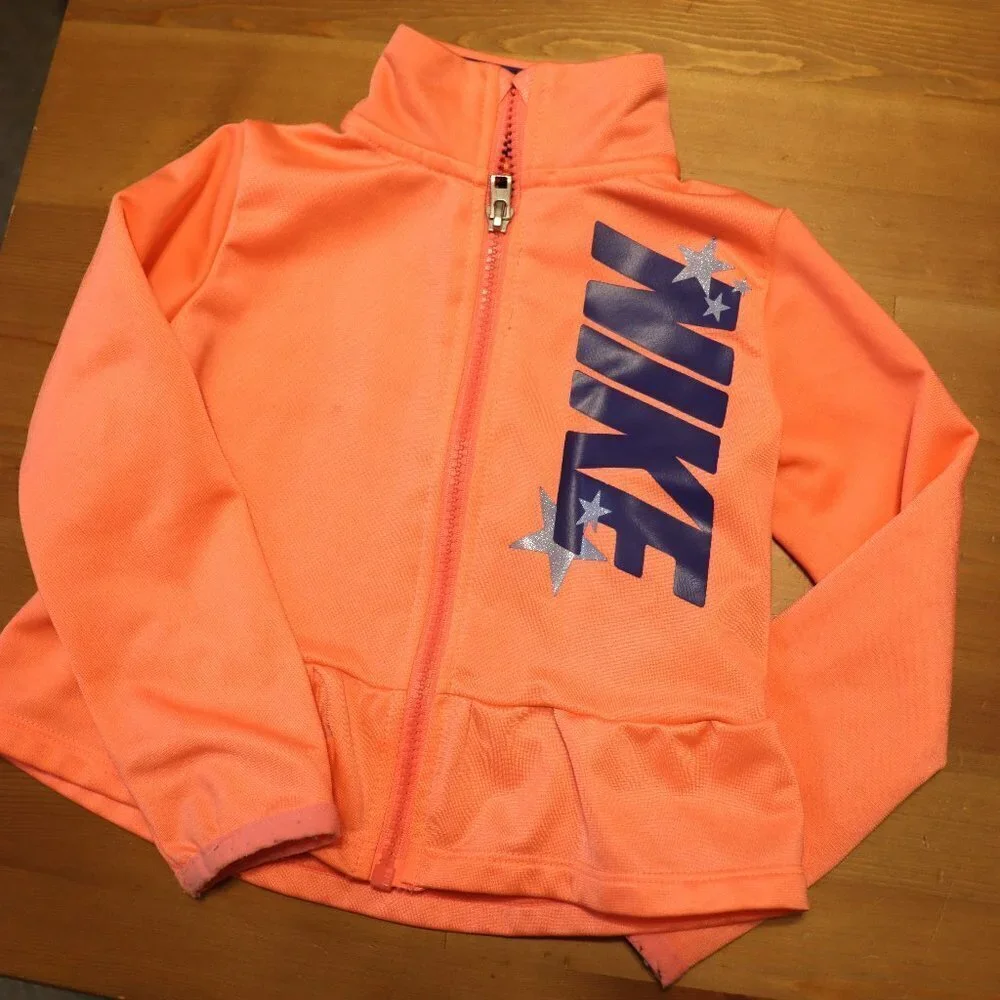 Nike Pink Zip-up Sweatshirt 2T, pink with blue writing & stars, ruffle bottom
